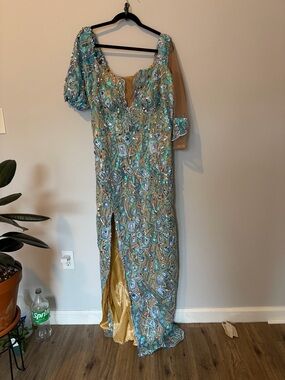 Handmade Blue Sequins Gown gold liner.
